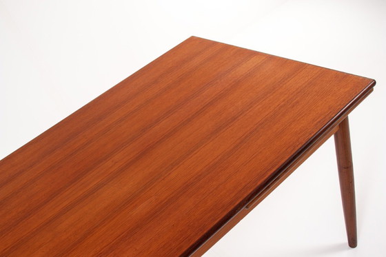 Image 1 of Uitschuifbare eettafel van teakhout in mid-century stijl