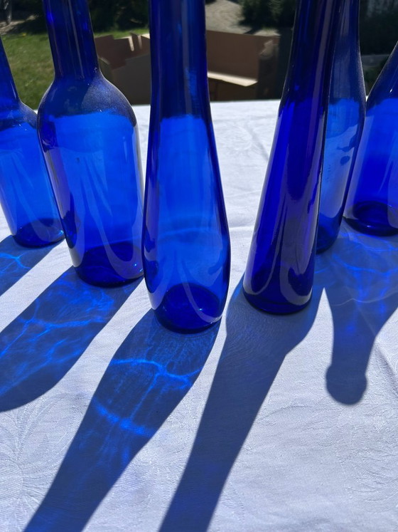 Image 1 of Set van 6 kobaltblauwe glazen flessen/vazen/vintage blauwe decoraties