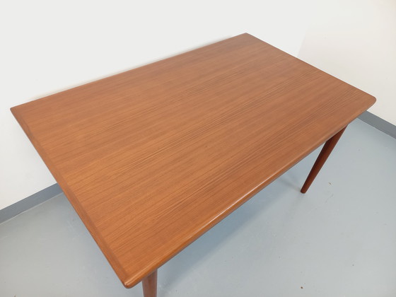 Image 1 of Scandinavian 60's vintage Dyrlund rectangular teak dining table with extensions