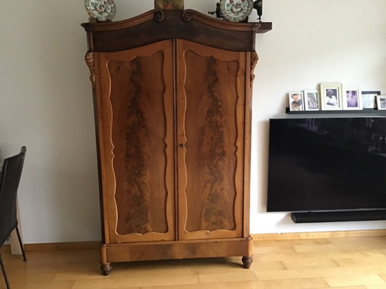 Image 1 of 2 small tables and 1 large table and a cupboard