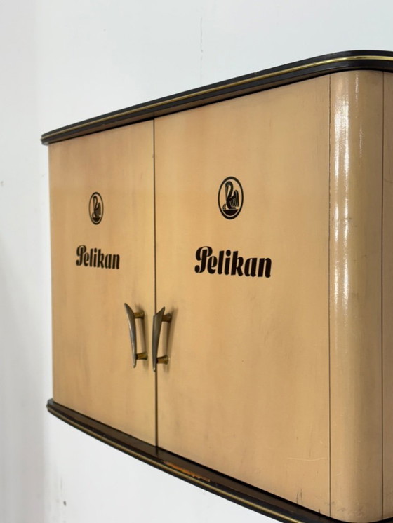 Image 1 of Beautiful vintage Pelikan wall cabinet, wall cupboard, hanging display cabinet, mid-century modern