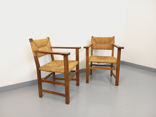 Suite de 2 fauteuils brutalistes vintage en bois de chêne et paille des années 60