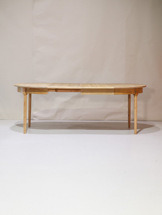 Image 1 of Extendable dining table Henning Kjaernulf oak Danish