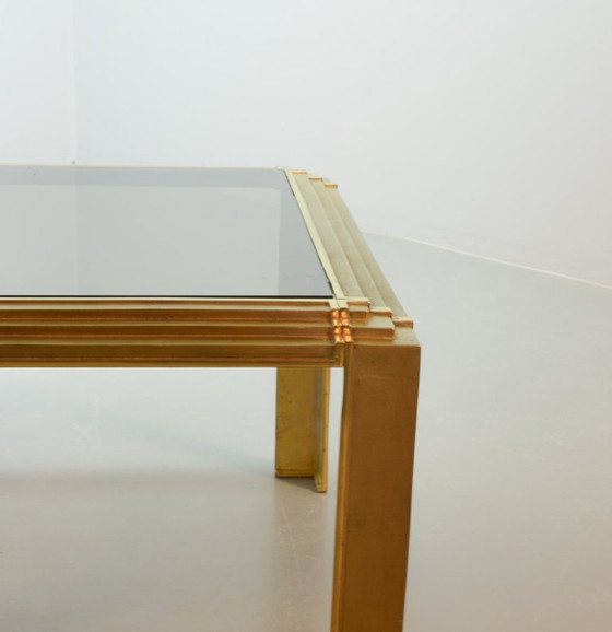 Image 1 of Hollywood Regency Solid Brass Square Coffee Table with Smokey Glass Top Attributed to Peter Ghyczy, 1970s. 