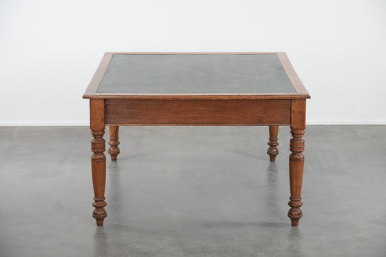 Image 1 of Antique writing table/partner desk with 4 drawers and a green leather top