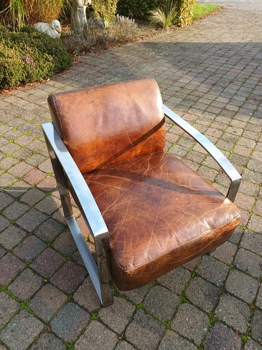 2x Vintage Fauteuils leer en chroom