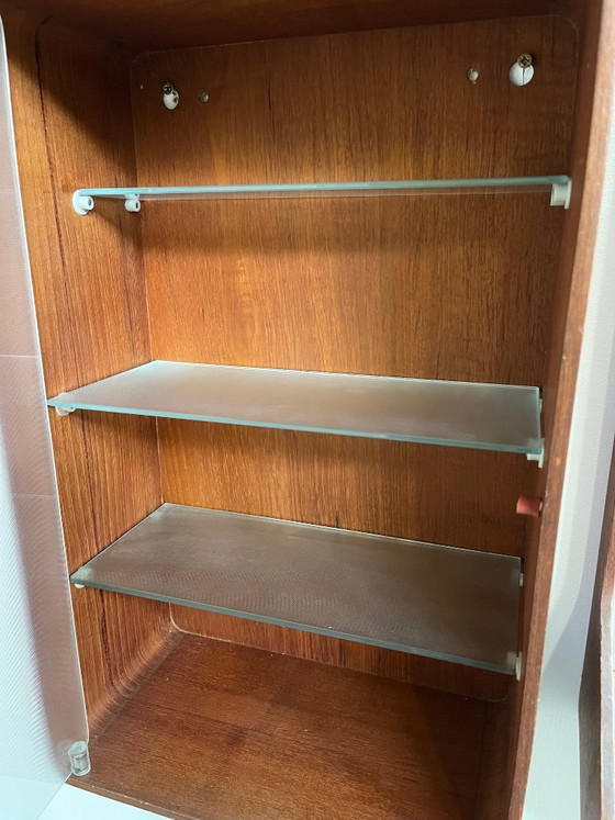 Image 1 of Euroika mirror and medicine cabinet made of teak, designed by Friso Kramer for Auping in 1963.