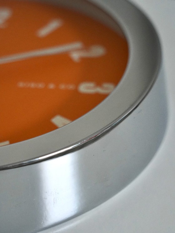 Image 1 of Vintage Siso & Co wandklok – jaren 70 popart oranje & chroom – Duits uurwerk