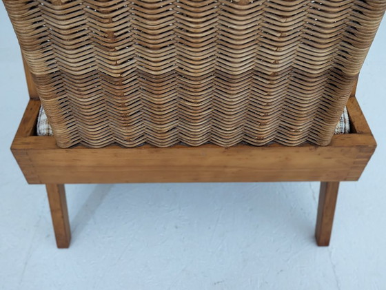 Image 1 of Skulpturaler Sessel aus Buche und Rattan mit Fußhocker von ÚĽUV, 1960er Jahre