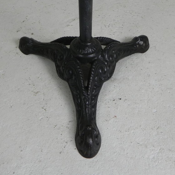 Image 1 of Bistro table with cast iron legs and round steel top, 1930s