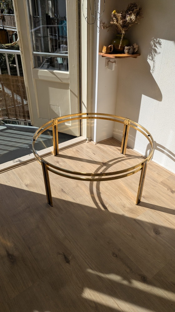 Image 1 of Hollywood Regency salontafel van zwart messing en gerookt glas
