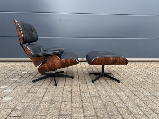 Poltrona lounge Vitra Eames XL + poggiapiedi, in pregiata pelle nera e palissandro Santos. NUOVA!!