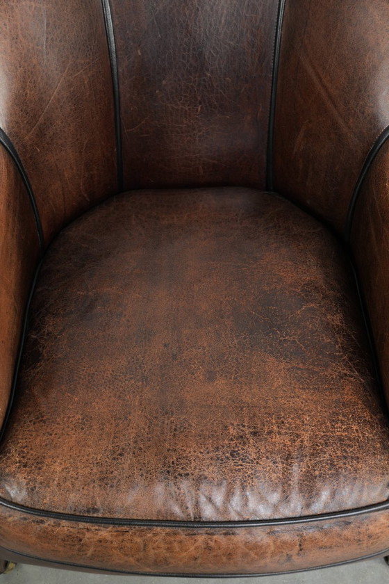 Characterful and comfortable vintage sheepskin armchair with a unique design and a timeless look – Leather (photo 6 of 15)