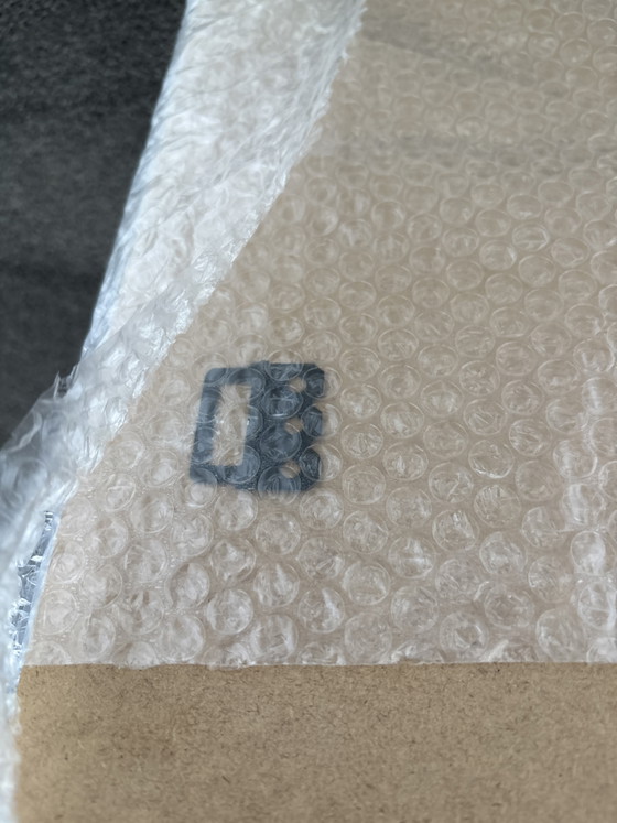 Image 1 of Immagine pubblicitaria vintage di Chanel su legno.