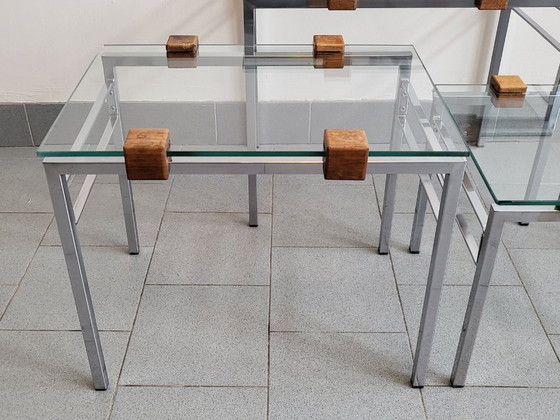 Image 1 of SET DI 3 TAVOLINI IMPILABILI SCANDINAVI VINTAGE ANNI '60 IN TEAK, ACCIAIO E VETRO ANNI '60