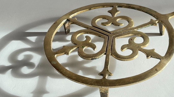 Image 1 of Solid brass trivet
