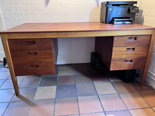 Vintage teakhouten bureau met 6 lades