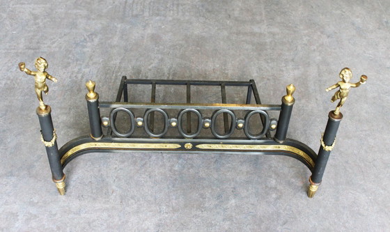 Image 1 of Paar vuurbokken en houtblokkenhouders van gietijzer en verguld brons, Empire-stijl, begin 19e eeuw