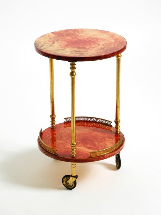 Image 1 of Round, small 1960s Aldo Tura serving or bar trolley in red goatskin leather | Made in Italy