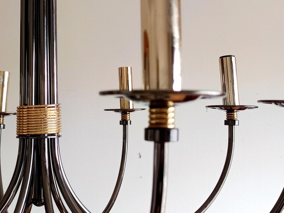 Image 1 of Vintage kroonluchter met 8 armen van zilver en goudkleurig metaal