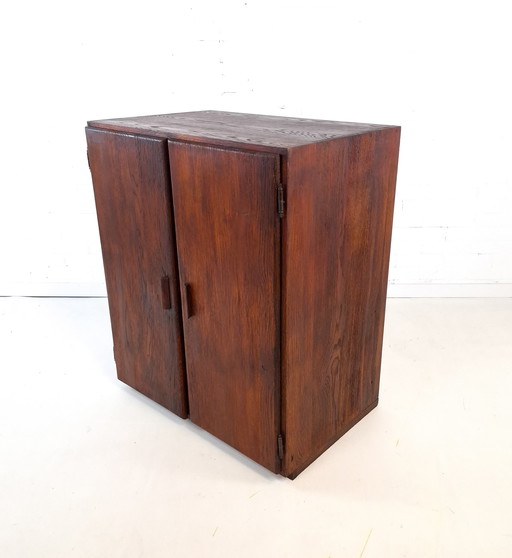 Vintage Art Deco style sideboard with rough dark brown wood
