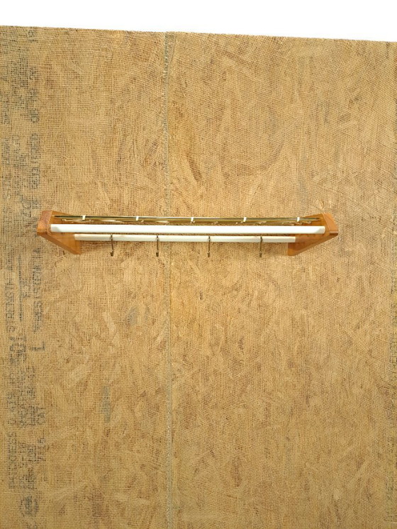 Image 1 of Coat rack from Sweden gold with wood, no. 11