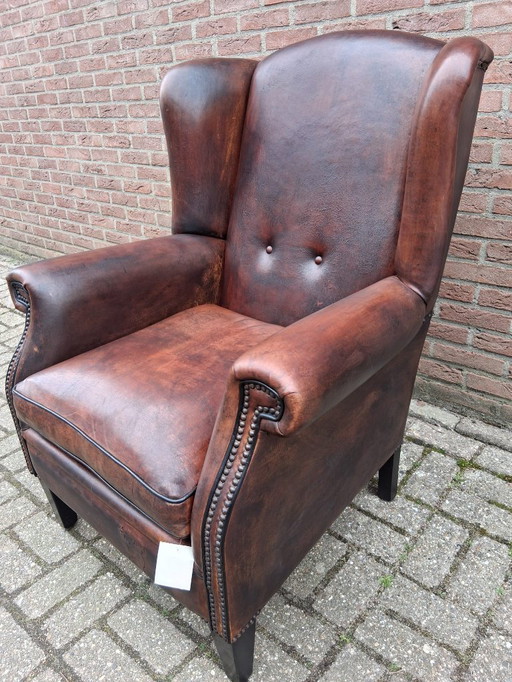 Sillón orejero de auténtica piel de oveja