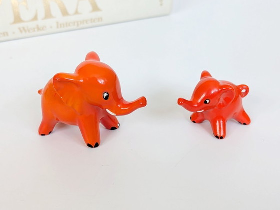 Image 1 of Goebel West Germany Elephant Pair Tangerine Orange Porcelain 1970s MCM Figurines