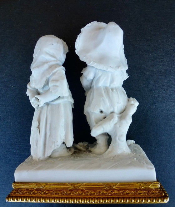 Image 1 of Luxury sponge porcelain figurine with gold leaf finish.