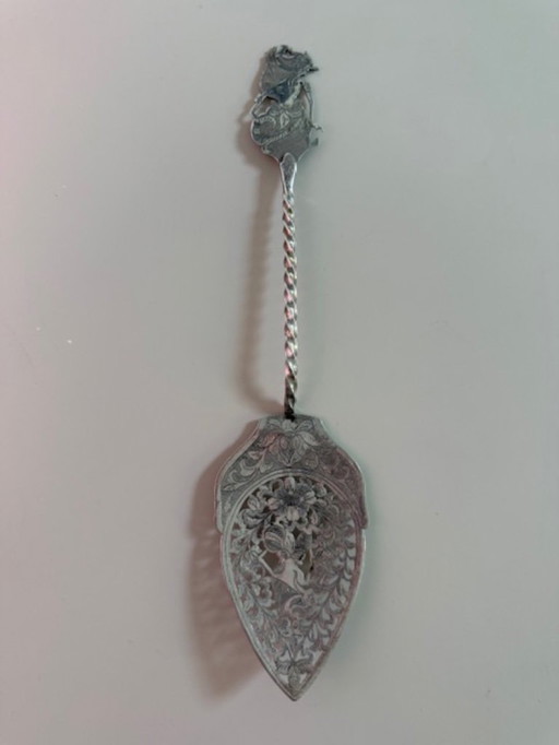 Antique silver cake server