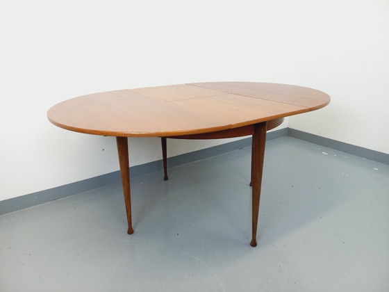 Image 1 of Vintage Scandinavian style round teak dining table from the 1950s/60s with extension