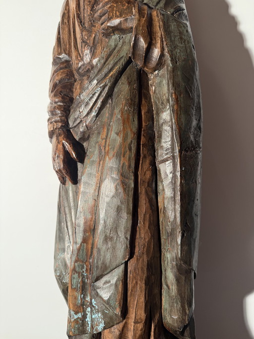 Old large wooden statue of Mary