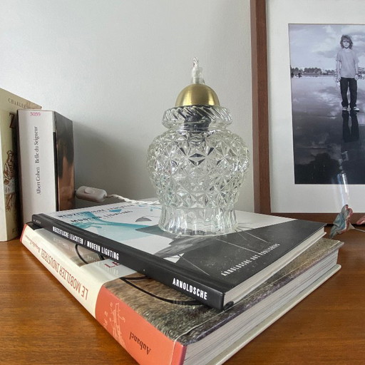 Lámpara portátil antigua de globo en vidrio transparente