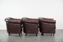 3 fauteuils club Chesterfield classiques en cuir de vachette