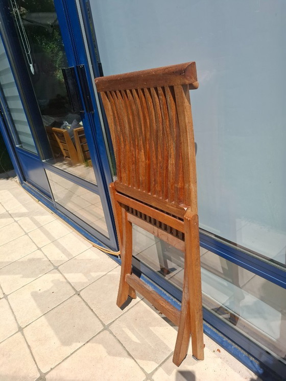 Image 1 of Lot de 4 chaises de jardin pliantes en Teck massif + 4 coussins de chaises à dossier offerts