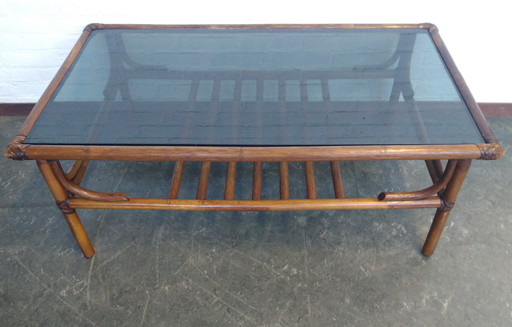 Rohé coffee table with smoked glass and leather bindings