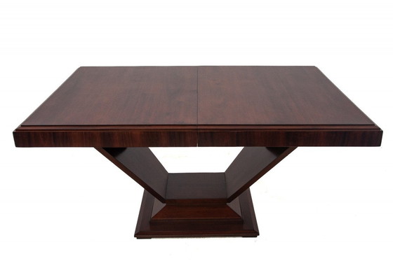 Image 1 of  zoom_in Original walnut extendable table, designed by Louis Majorelle, with 6 Art Deco chairs.
