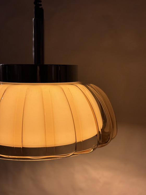 Image 1 of Vintage oranje Dijkstra bloem hanglamp uit de jaren 70 met een futuristisch design.