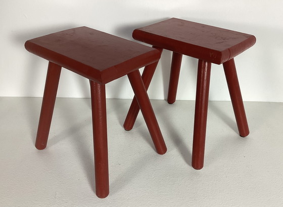 Image 1 of Two red vintage wooden stools side tables