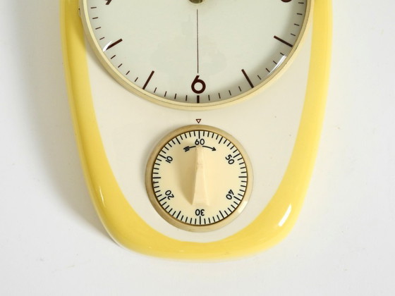 Image 1 of Beautiful battery-operated Mid-Century Modern wall clock by Mauthe with a glazed ceramic case
