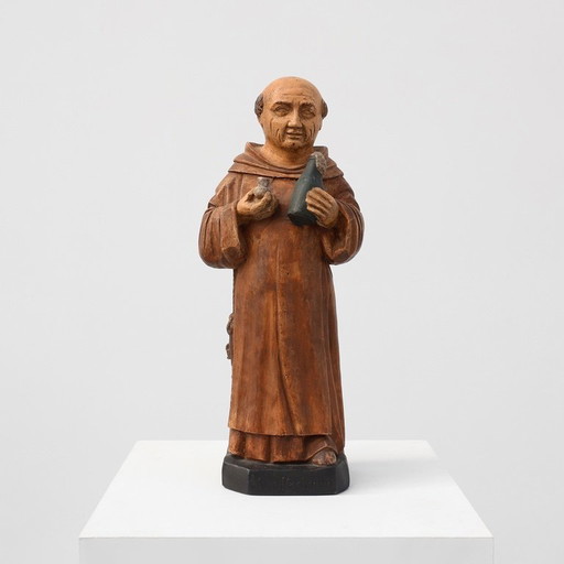 Figura pubblicitaria dello Champagne Dom Pérignon firmata J.L. Delaroche