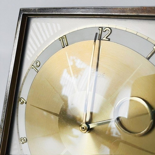 Horloge de table art déco Kienzle starburst en laiton années 1930