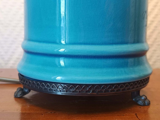 Image 1 of Blue ceramic lamp with claw feet and foliage lampshade