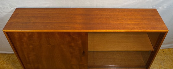 Image 1 of Mid Century Retro Teak & Glass Bookcase by Herbert E. Gibbs Circa 1960  A stylish and elegant mid century modern teak and glass 