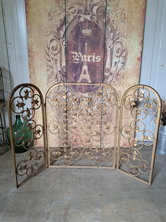 Image 1 of Antiek goudkleurig haardscherm . 61cm breed, zijkanten beweegbaar 31cm, en 77cm hoog.