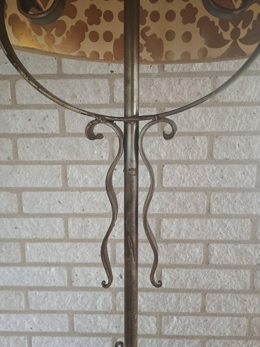 Elegant adjustable wrought iron floor lamp