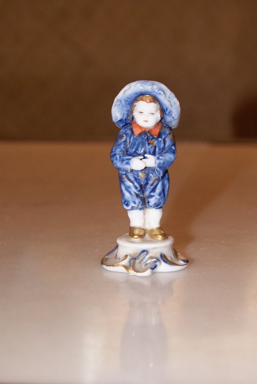 TICHE porcelain figurine.
