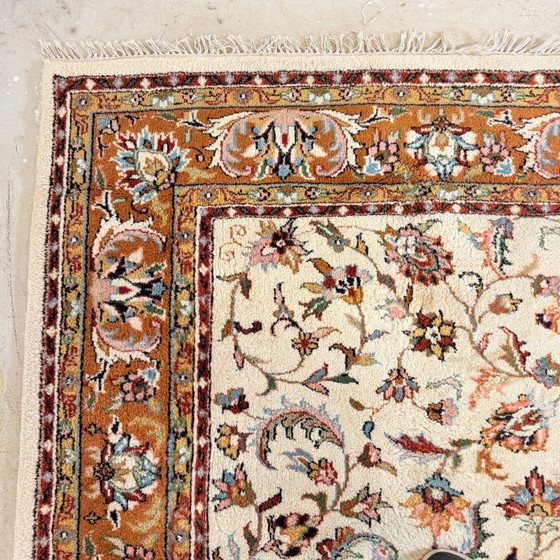 Image 1 of Large vintage rug with floral pattern