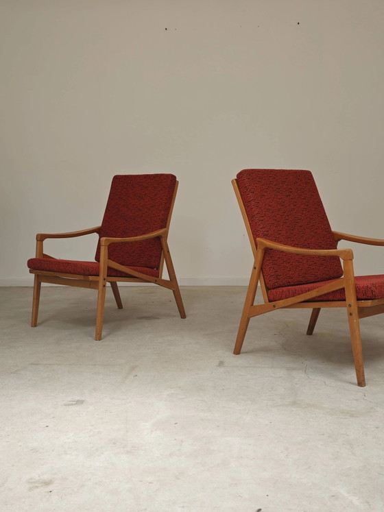 Pair of Jiri Jiroutek red armchairs by Intérier Praha – Wood, Mid Century Modern (photo 3 of 13)
