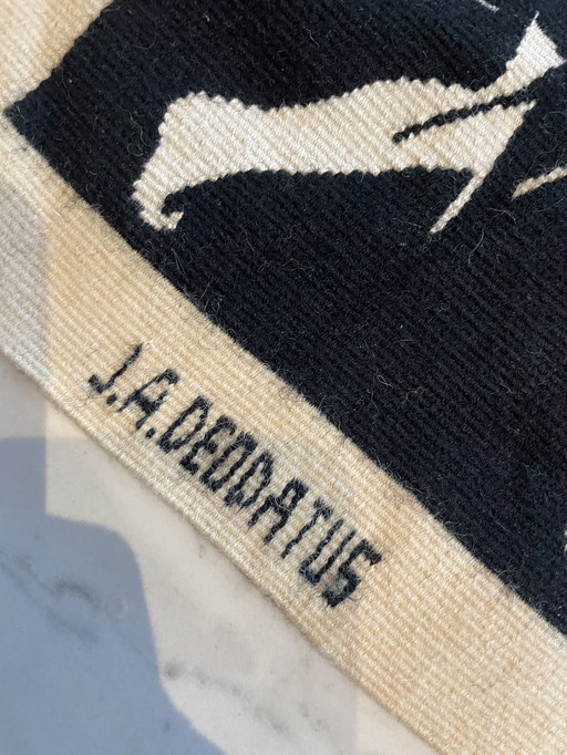 Pequeña obra de arte tejida de JA Deodatus